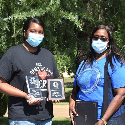 ESS Director Rinsey McSwain (right) recently presented the ESS overall 2019 Employee of the Year award to Santanna Arrington of Heidelberg.