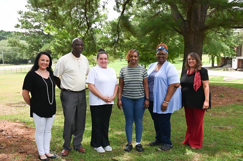 Congratulating the Winners are (left to right) Andrea Walters, Prog. Admin.; John Wilson, NHA.; (far right) Amy Smith, NHA. Winners are (third from left) Lisa Holifield; Nichole White; Georgia Ducksworth; and (Not Pictured) Carolyn Barboza.