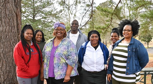 Congratulating the Winners are (Back Row Left to Right) Tawanda Jones, Assist. NHA; John Wilson, NHA; and Stacey Franklin, SCP Supervisor. Winners are (Front Row Left to Right) Sahara Jefferson, Georgia Ducksworth, Ethel Boykin, and Tatania Scott.