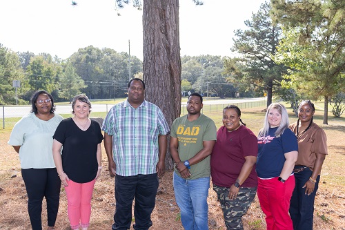 (Left to Right): Tasheba Simpson, Active Treatment Tech. at Richton Community Homes; Andrea Walters, Prog. Admin. of Paul D. Cotten, Sr.; Dr. Tori Gray, Program Dir. of Hillside; Congratulations to the Winners (Beginning 4th person, L to R) Donnie McDonald, Schkelia Ellis, Meagan Malone, and Sakira Husband.