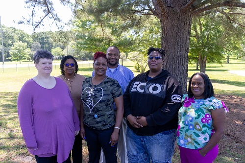 (Back: Left to Right): Margo Knight, NHA Assist. Dir. at P.D.C Unit, Timothy McCormick, Director of Richton Comm. Homes. (Front Lift to Right): Winner Michaeal Griffith, Winner Roslain Bolton, Winner Nathaniel Emmons and Tawanda Jones, NHA Assist. Dir. of Pecan Grove Units. (Not in photo: Eliza Gates)