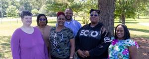 (Back: Left to Right): Margo Knight, NHA Assist. Dir. at P.D.C Unit, Timothy McCormick, Director of Richton Comm. Homes. (Front Lift to Right): Winner Michaeal Griffith, Winner Roslain Bolton, Winner Nathaniel Emmons and Tawanda Jones, NHA Assist. Dir. of Pecan Grove Units. (Not in photo: Eliza Gates)