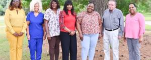 (Left to Right): (Administrator) Georgette Powell, Director of Prentiss Comm. Homes; Betty Butler, Brenda McNair, Kimetha Flowers, Sheena Crosby, (Administrators) Dr. Kenneth O’Neal, Asst. Dir. Of ESS; Cathy Lindsey, Shift Supervisor Coord.; (Winners Not Pictured: Ashley Oxner, Denise Cooley, Malcolm Rucker, & Georgia Moffett).